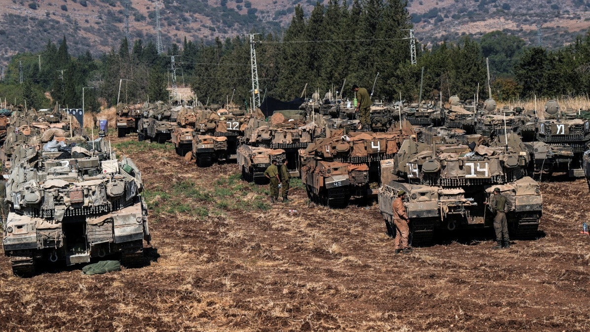 Israeli armoured military vehicles in formation, amid cross-border hostilities betweenÊHezbollahÊand Israel, in northern Israel. (Photo: Reuters)