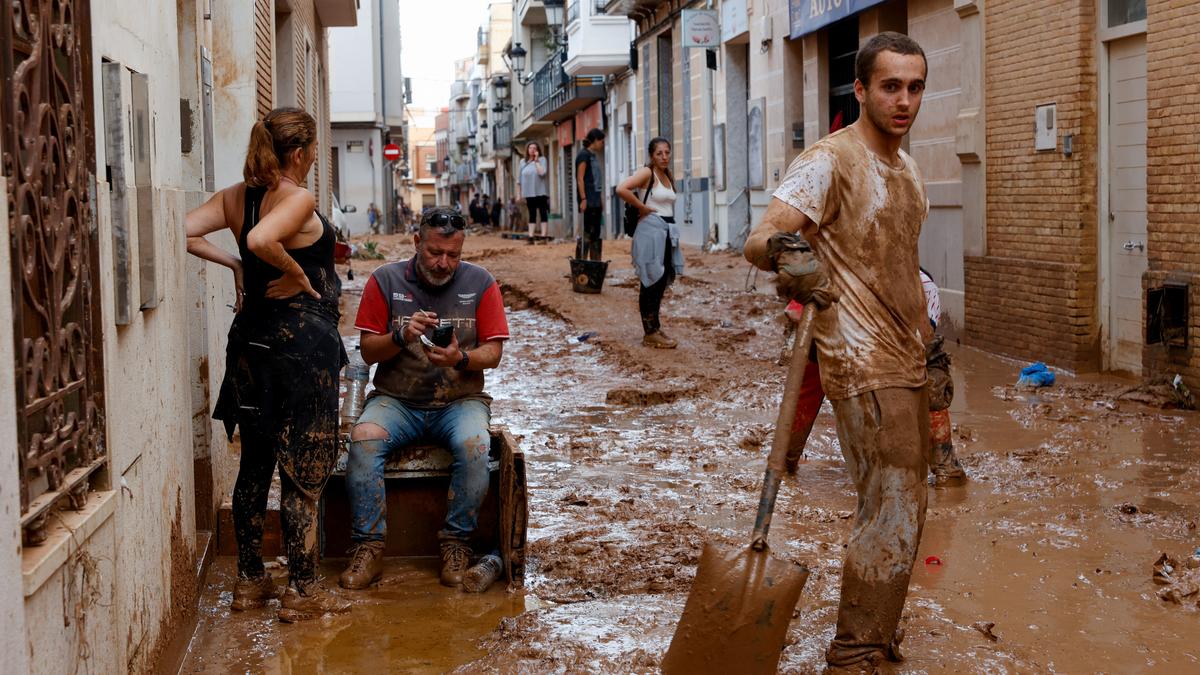 Spain searches for bodies after unprecedented flooding claims more than 150 lives