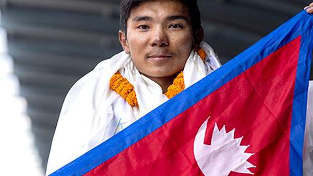 Record-setting teen climber returns home to Nepal to hero’s welcome