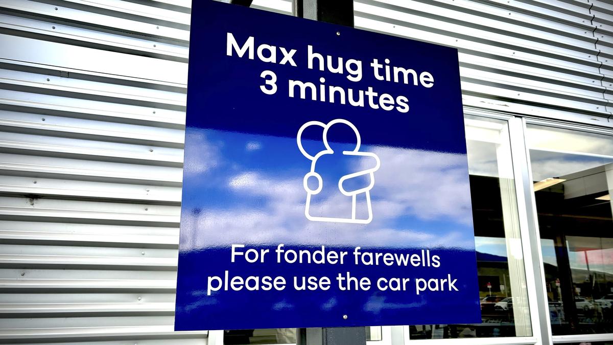 New Zealand airport imposes cuddle cap with 3-minute limit on goodbye hugs to avoid traffic jams